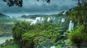 Rainy and cloudy view of Iguazú Falls