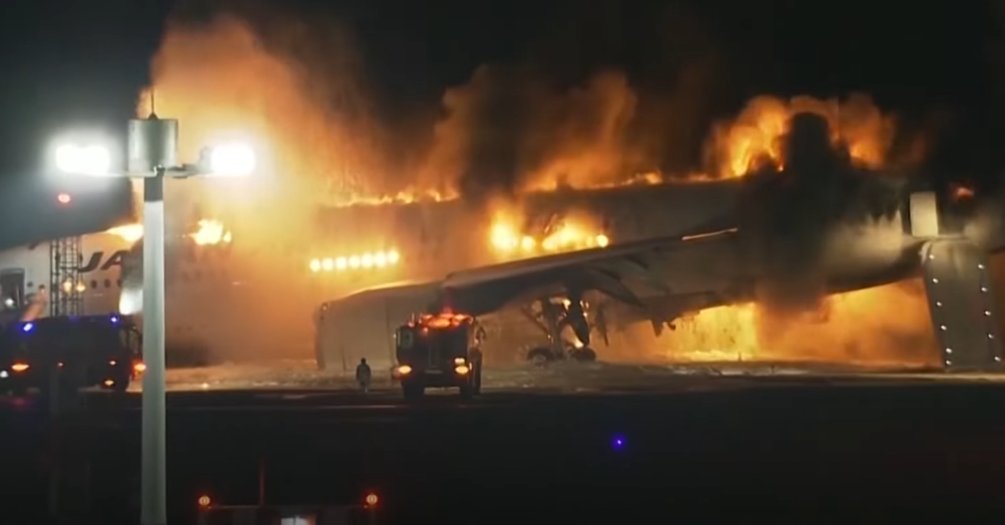 Japan Airlines plane catches fire on Haneda airport runway