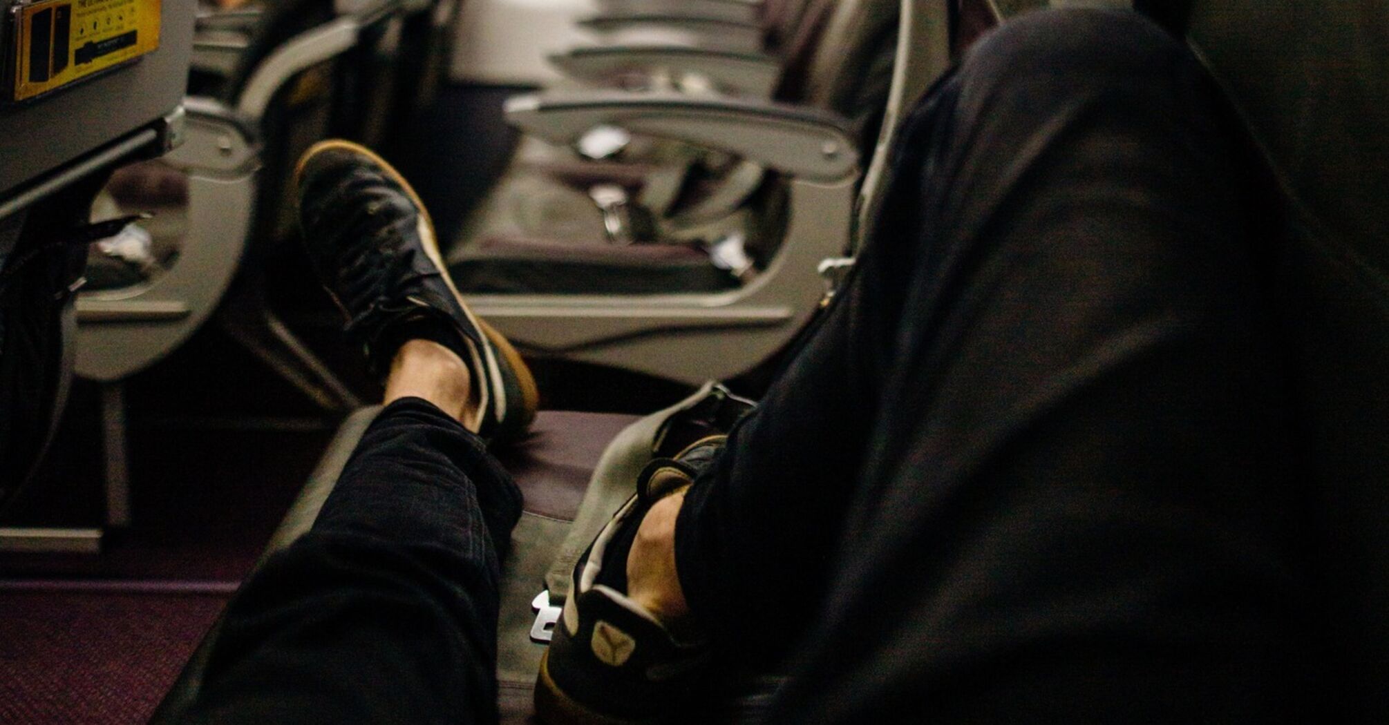What to do if your neighbor's feet invade your space on an airplane: advice from an etiquette expert