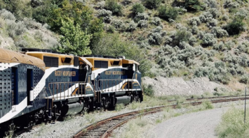 Rocky Mountaineer train on the road