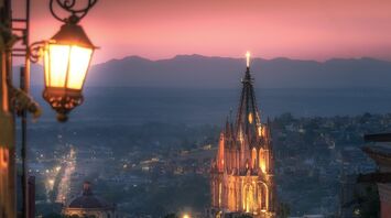 The cheapest way to fly to San Miguel de Allende and see the winner of 2 of the world's most beautiful cities
