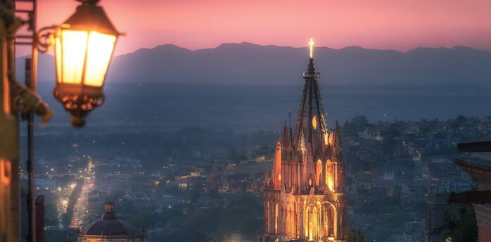 The cheapest way to fly to San Miguel de Allende and see the winner of 2 of the world's most beautiful cities