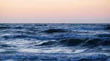 Waves on the open sea during sunset