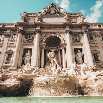 The majestic Trevi Fountain in Rome, showcasing its detailed Baroque sculptures and cascading waters