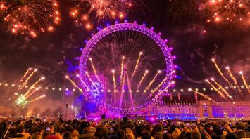 Crowd watching fireworks near the London Eye on New Year's Eve