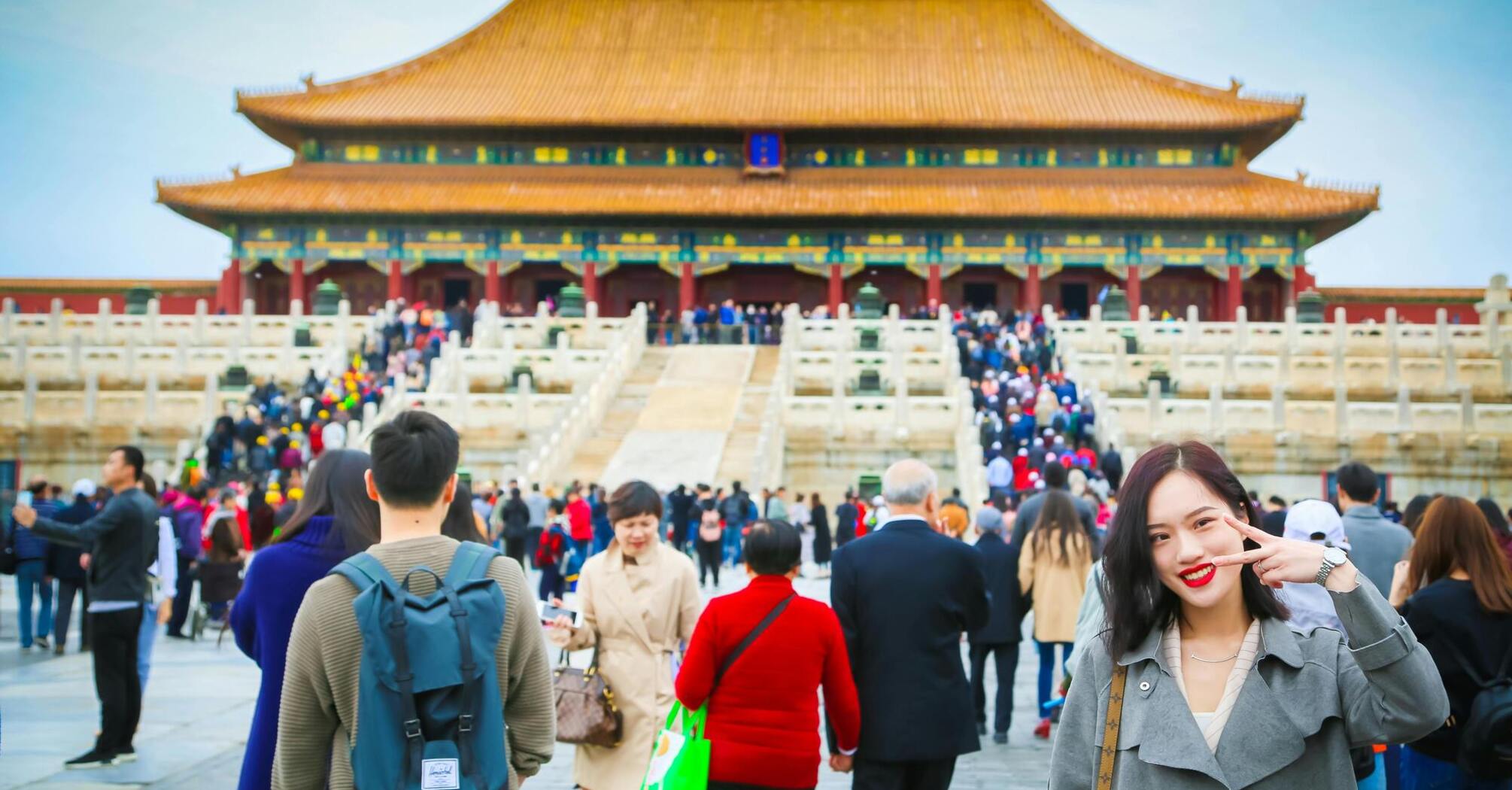 Tourists visiting the Forbidden City in Beijing, China