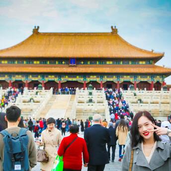 Tourists visiting the Forbidden City in Beijing, China