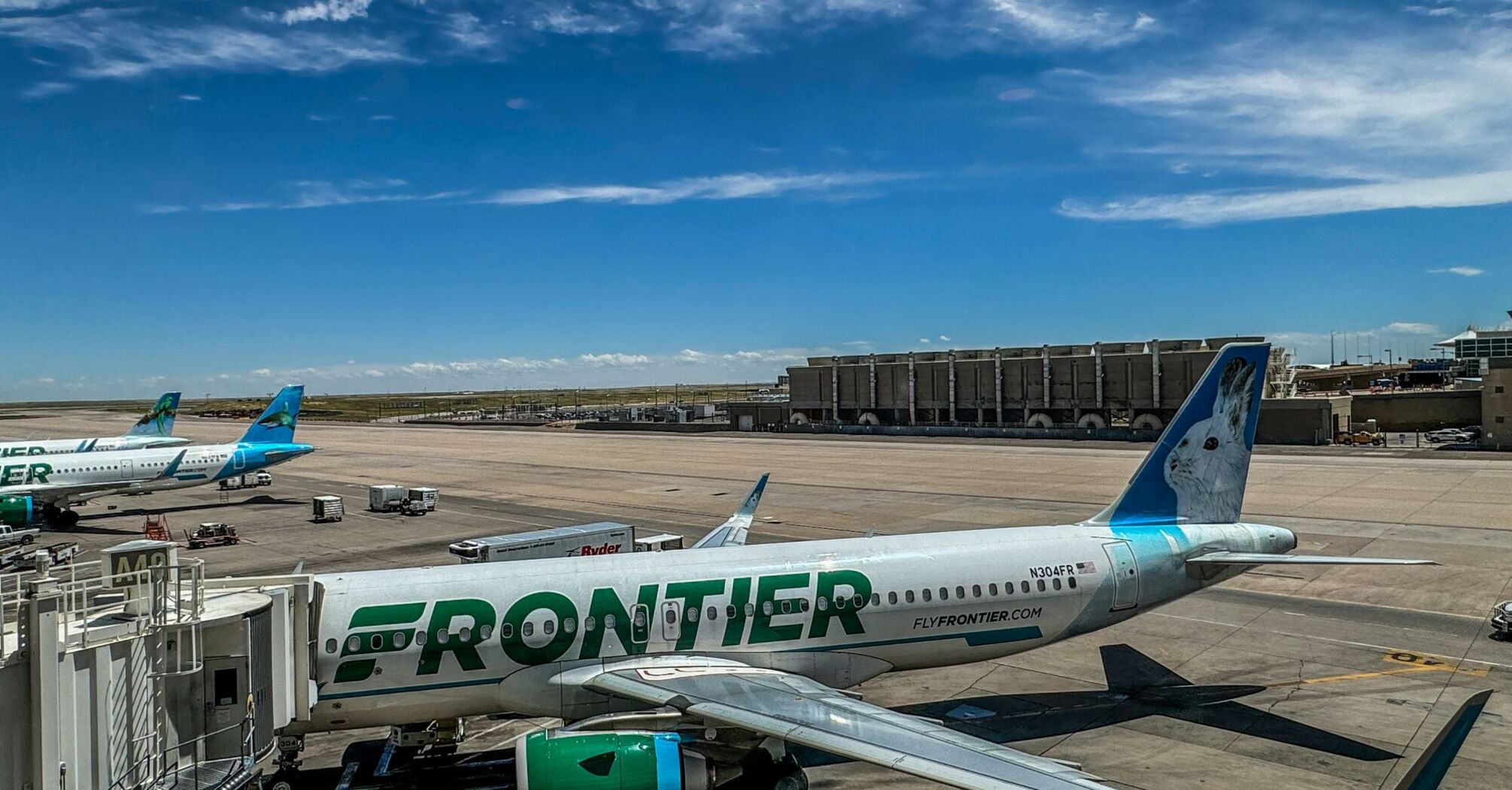 Frontier Airlines parked at Concourse A. Denver International Airport.