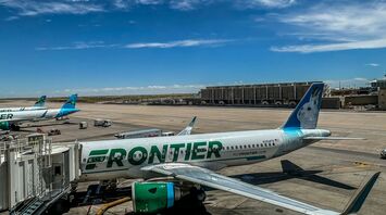Frontier Airlines parked at Concourse A. Denver International Airport.
