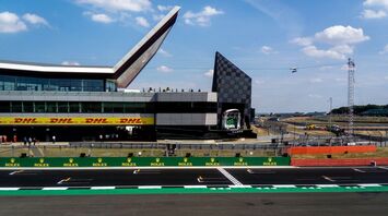 Silverstone Circuit building with track view during a motor racing event