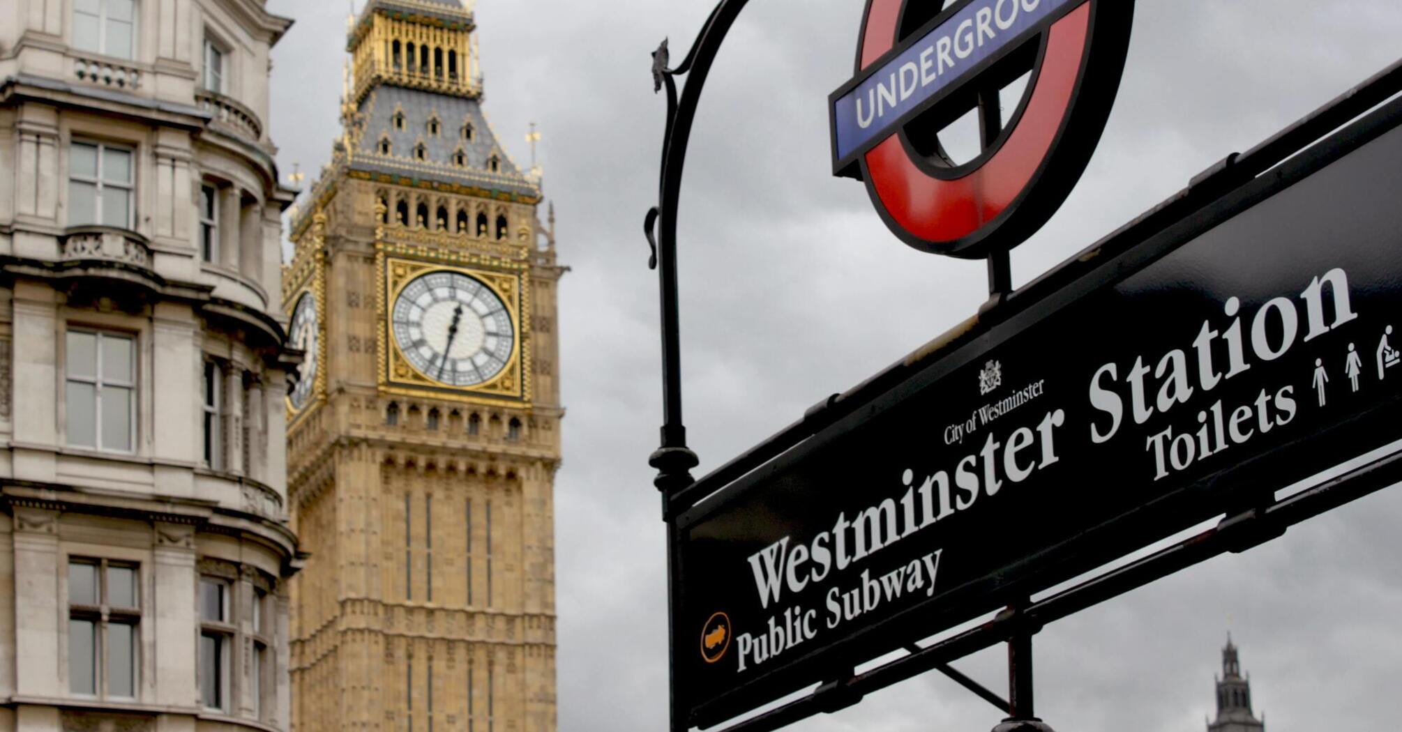 Big Ben and Westminster Underground Station sign in London