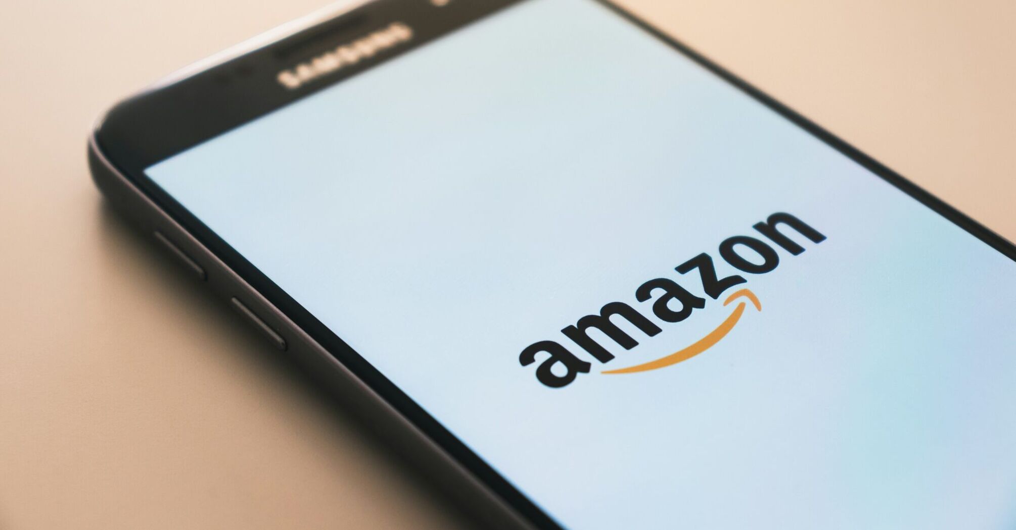 Amazon logo displayed on a smartphone screen