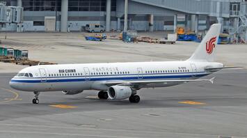Air China plane taxiing on the runway