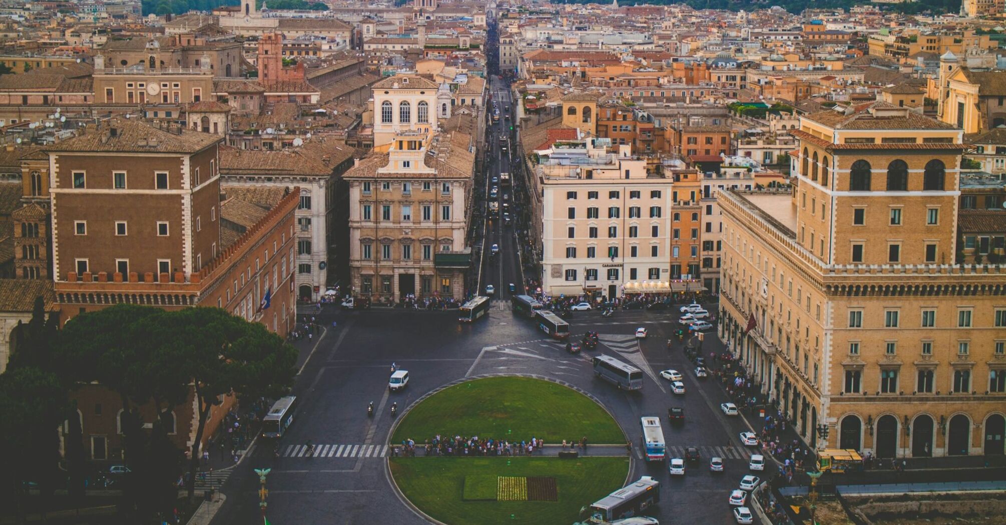 Aerial view of central Rome with busy streets and historical buildings