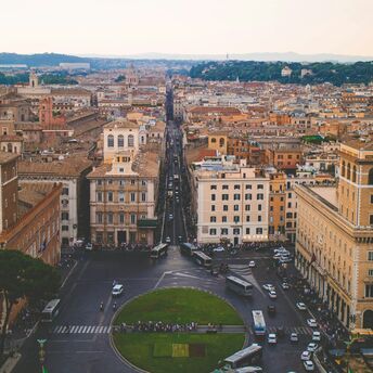 Aerial view of central Rome with busy streets and historical buildings