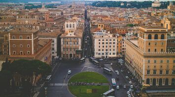 Aerial view of central Rome with busy streets and historical buildings