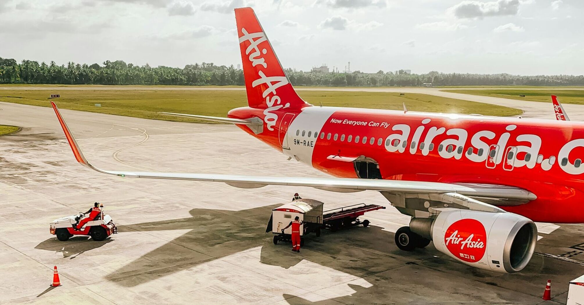 AirAsia aircraft preparing for departure on the tarmac at an airport