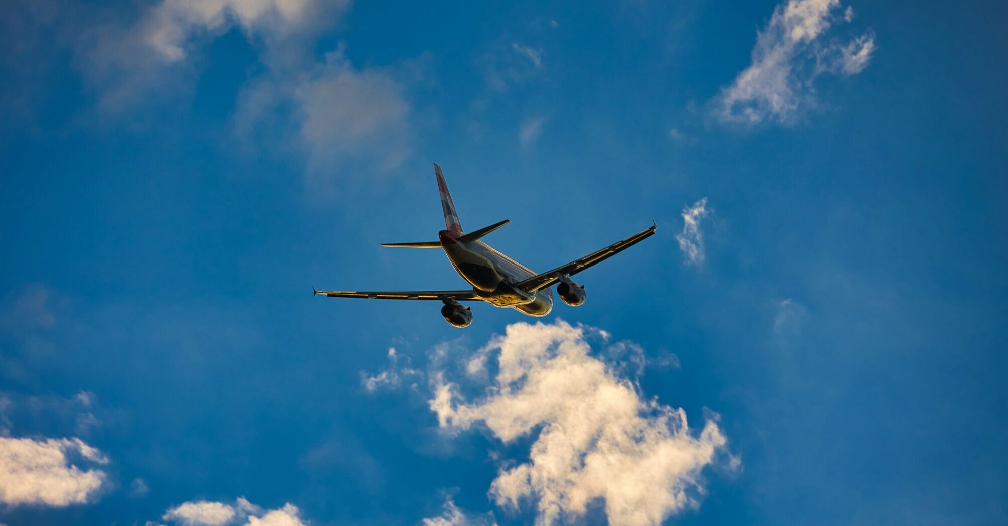 Airplane flying through a clear sky