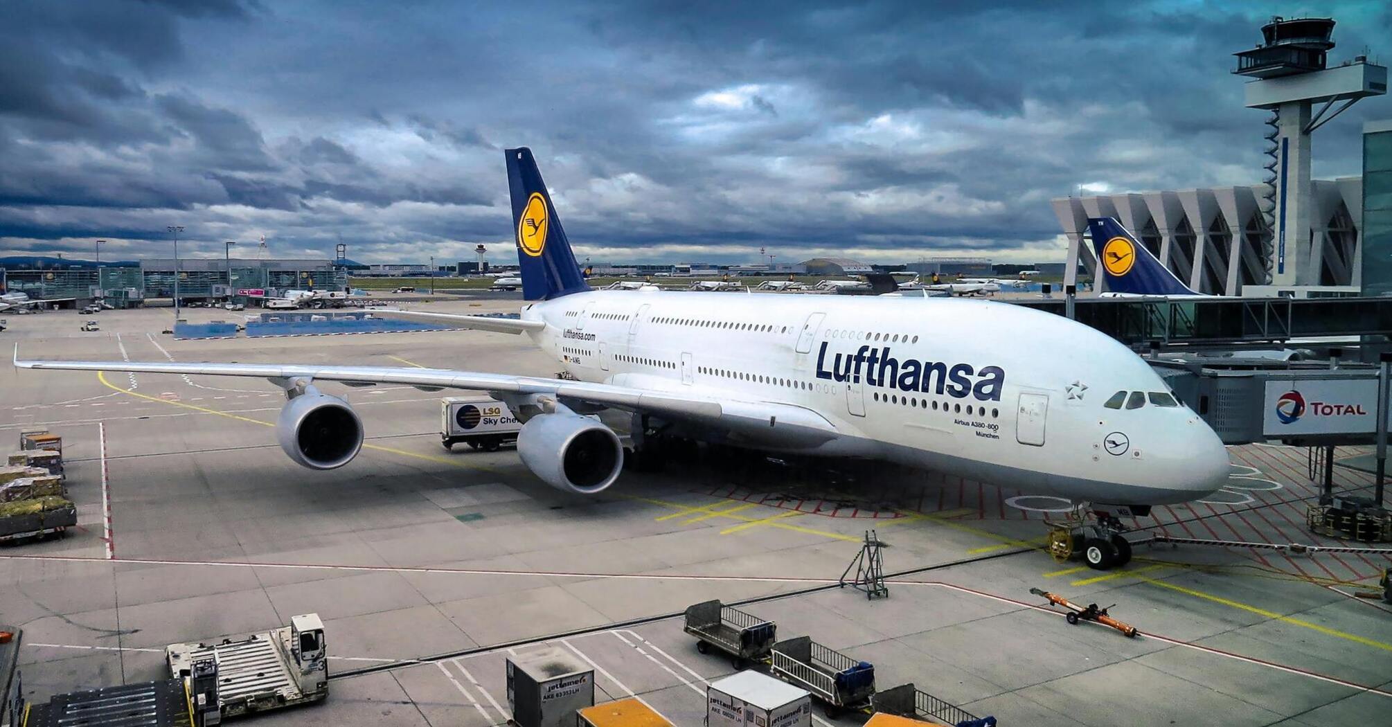 Lufthansa aircraft parked at the airport gate