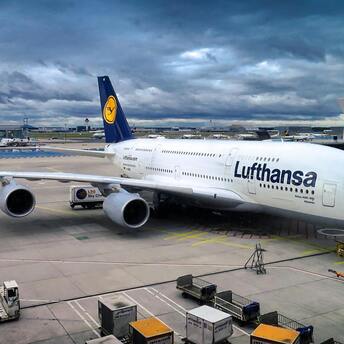 Lufthansa aircraft parked at the airport gate