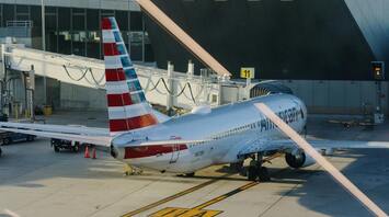 American Airlines plane parked at a gate