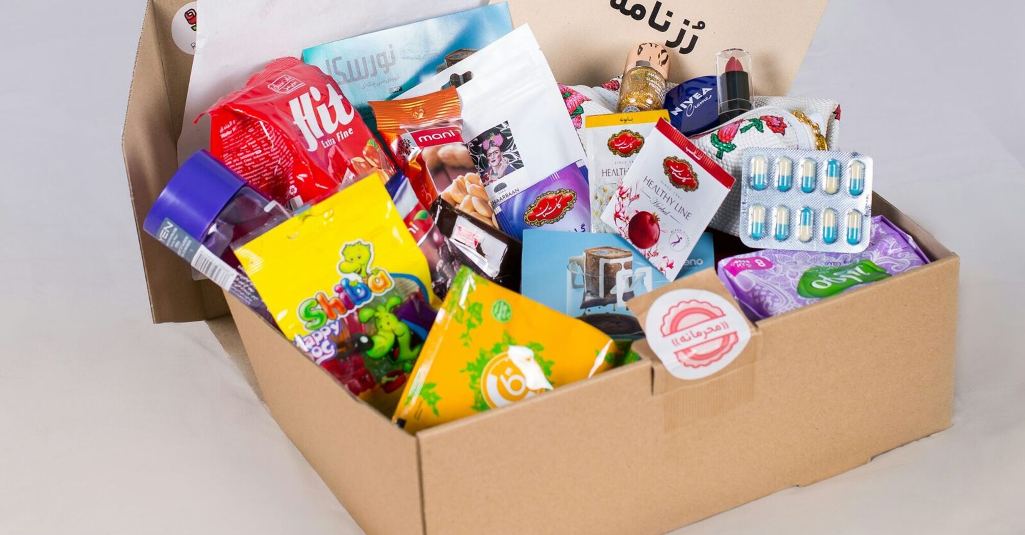 A snack box filled with assorted treats and local products