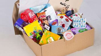 A snack box filled with assorted treats and local products