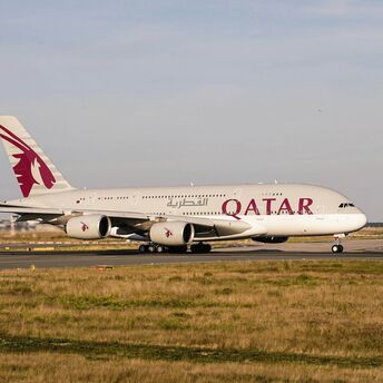 Qatar Airways airplane taxiing on the runway