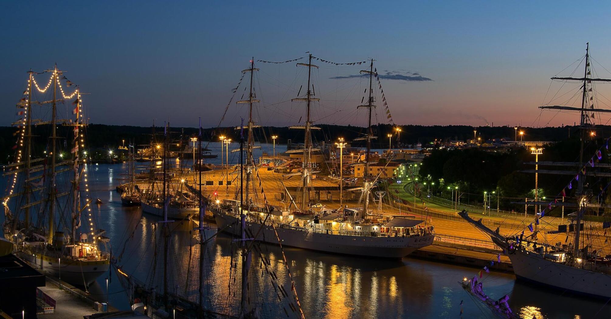 Night view of ships decorated with lights at Turku port, Finland