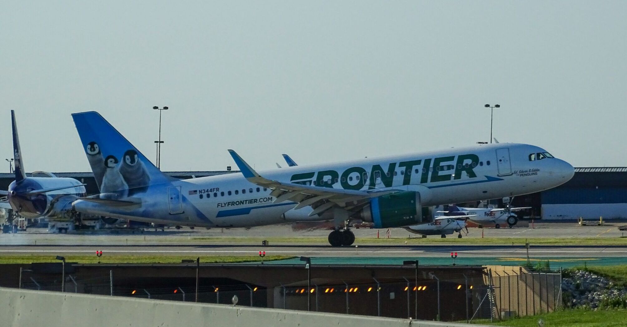 Frontier Airlines aircraft on the runway