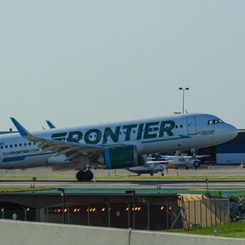 Frontier Airlines aircraft on the runway