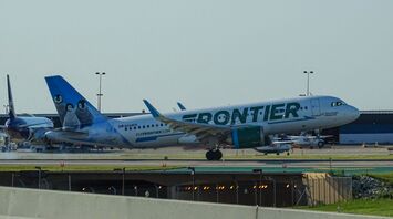 Frontier Airlines aircraft on the runway