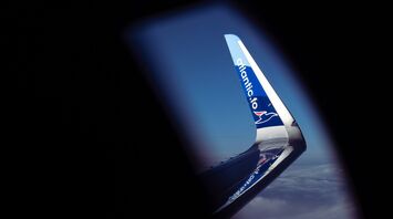 Spotting another flight over the wing of an Atlantic Airways flight