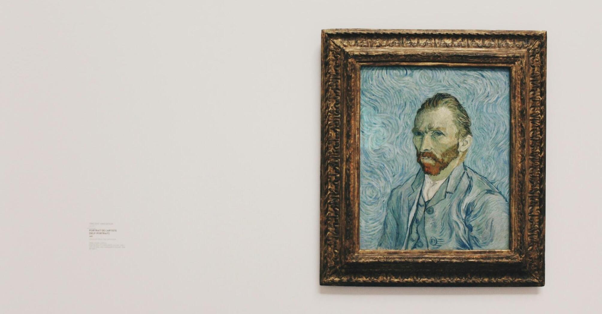 Van Gogh's self-portrait hanging on a museum wall