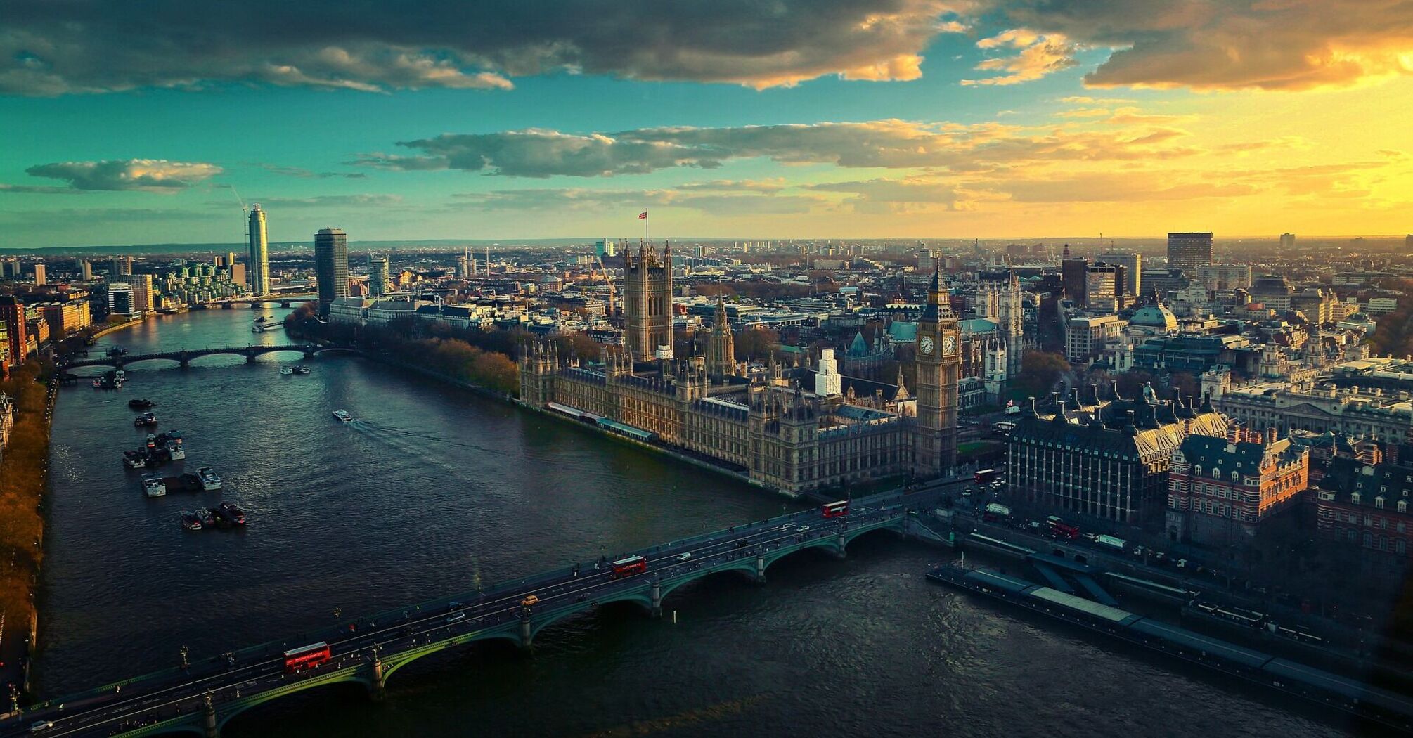 Aerial view of London with Big Ben and the Thames River at sunset