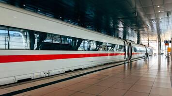 Modern high-speed train at a station platform in Europe