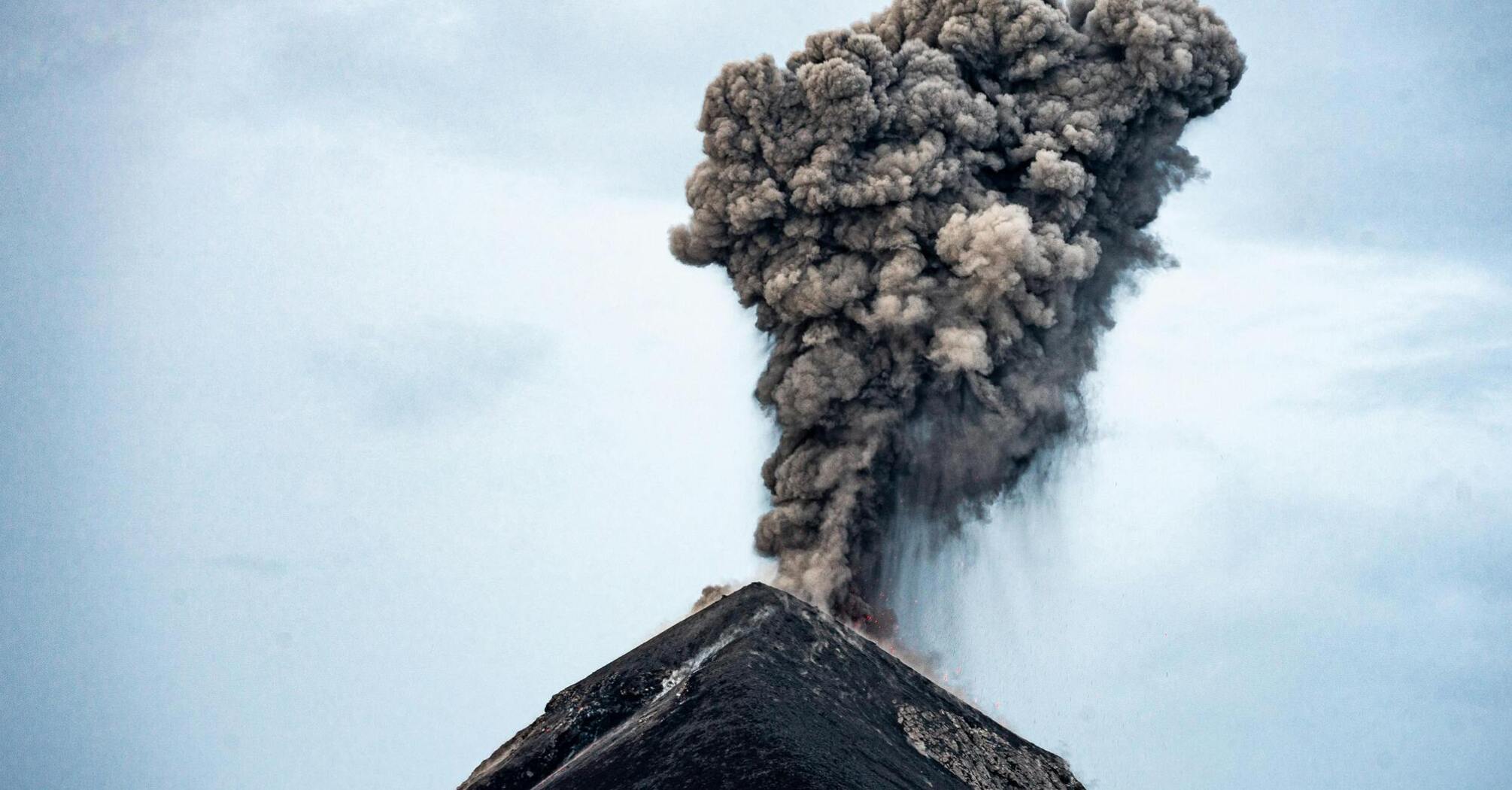 Volcanic ash cloud rising from an eruption