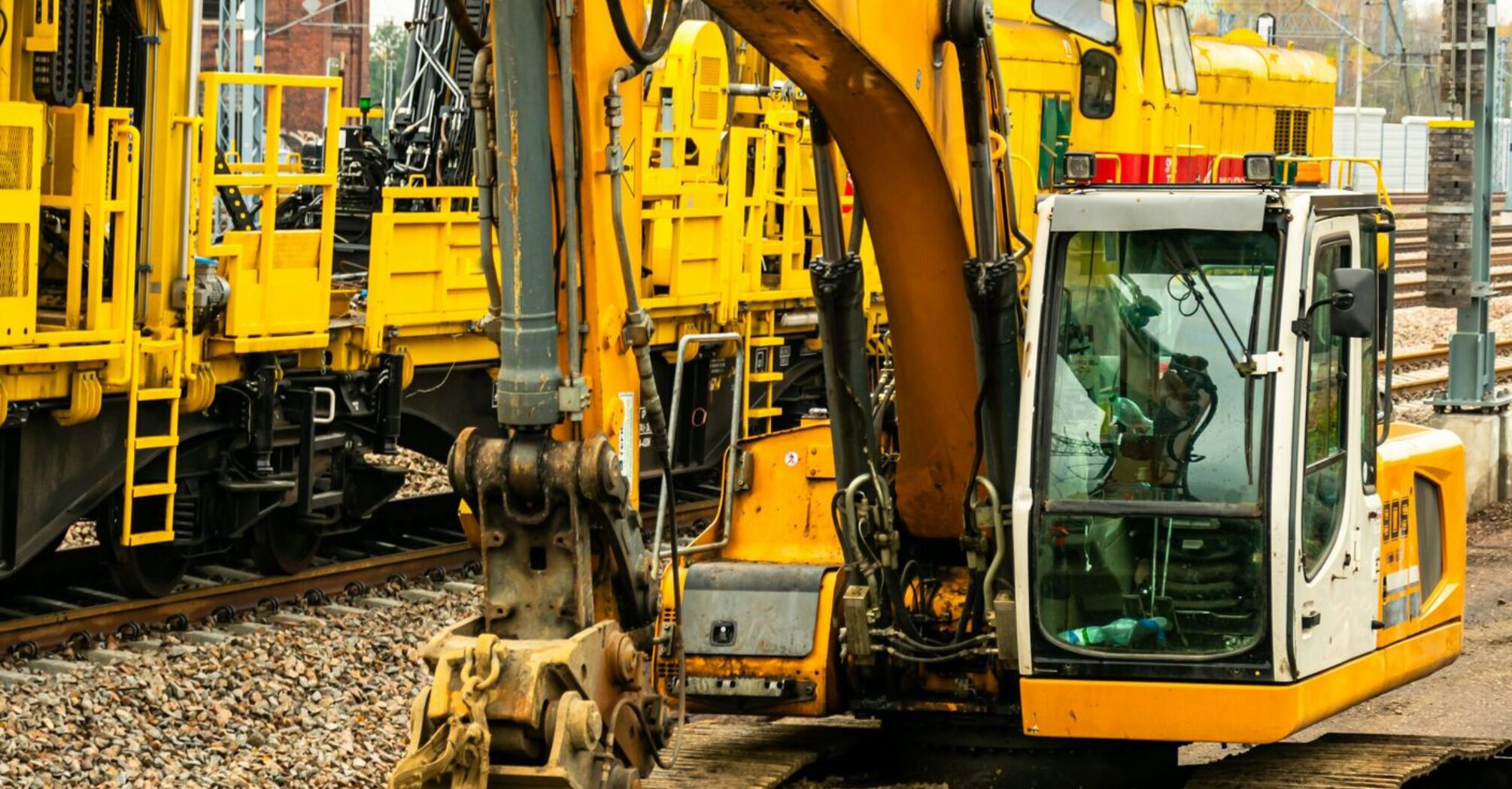 Construction equipment on railway tracks, preparing for track upgrades