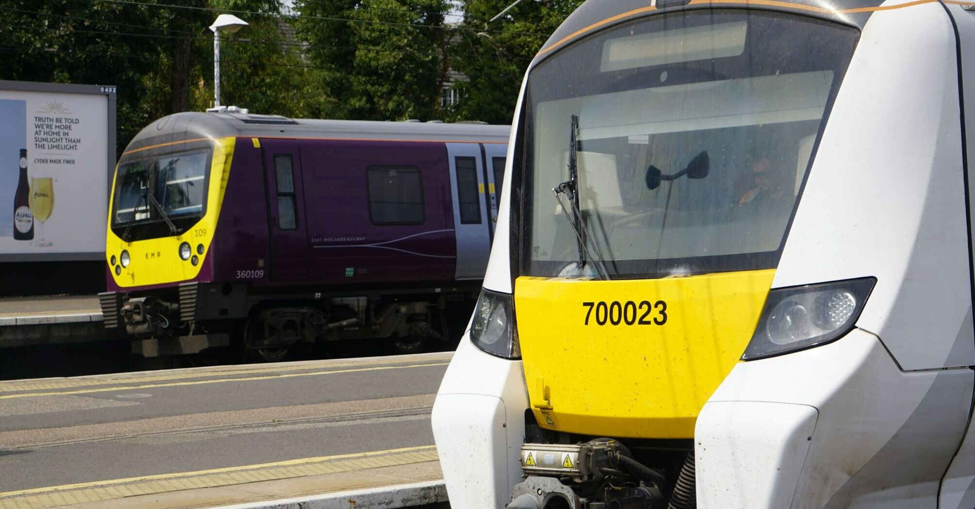 Two Thameslink trains at a station platform