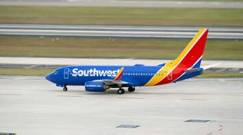 Southwest Airlines airplane parked on a runway