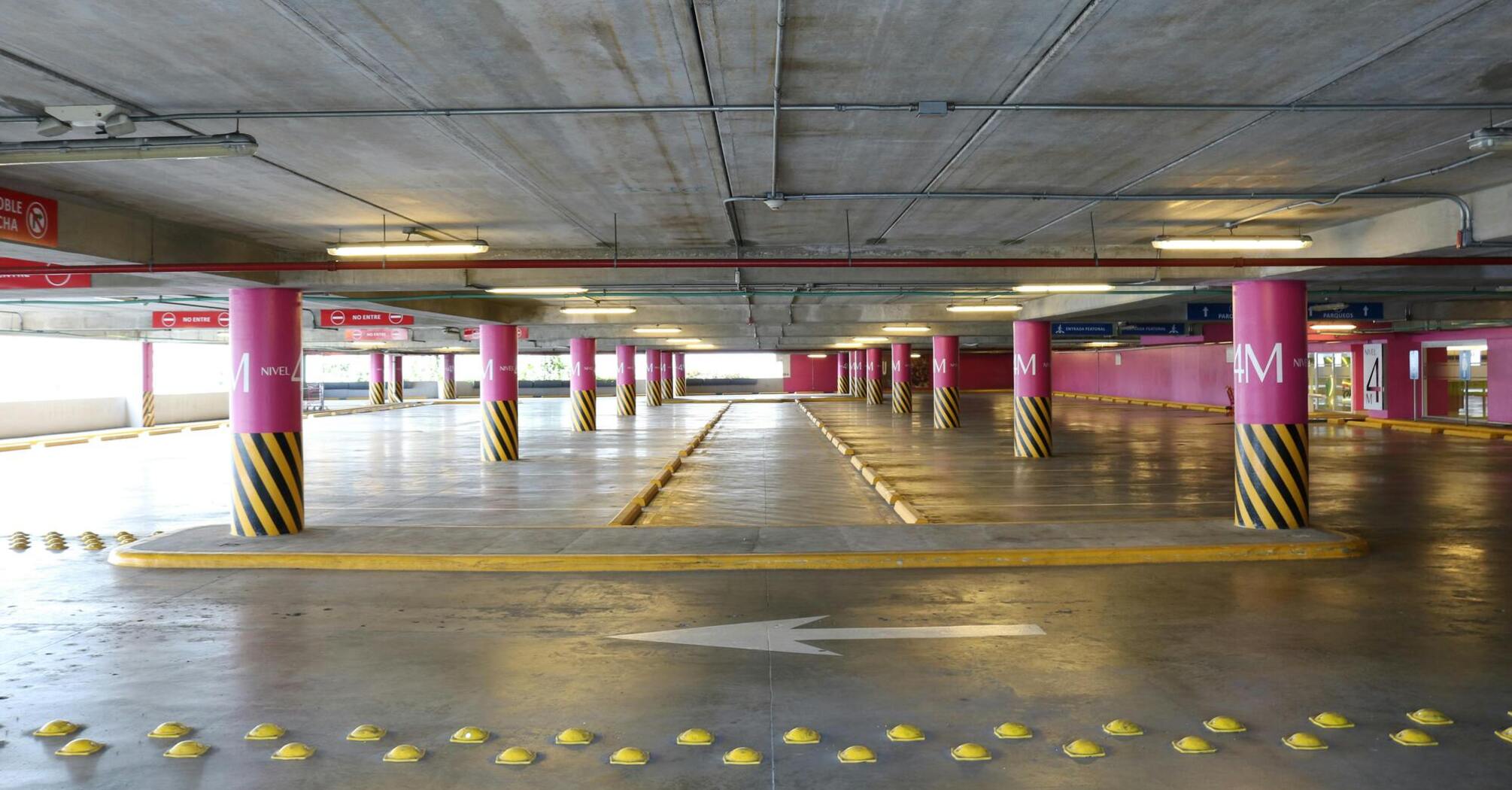 Empty parking garage with marked spaces