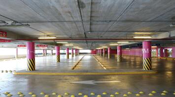 Empty parking garage with marked spaces