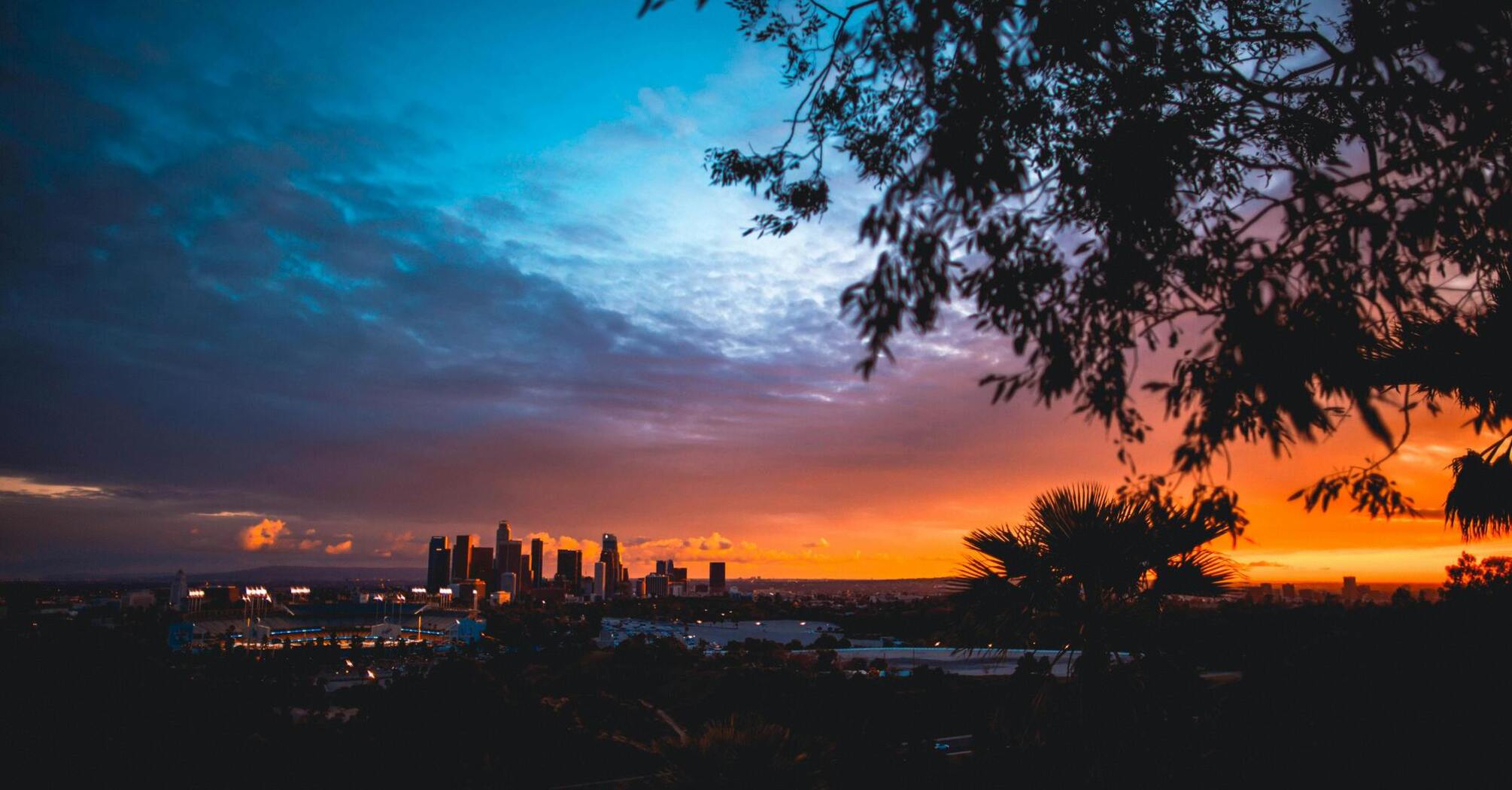 Los Angeles skyline at sunset with colorful skies