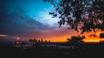 Los Angeles skyline at sunset with colorful skies