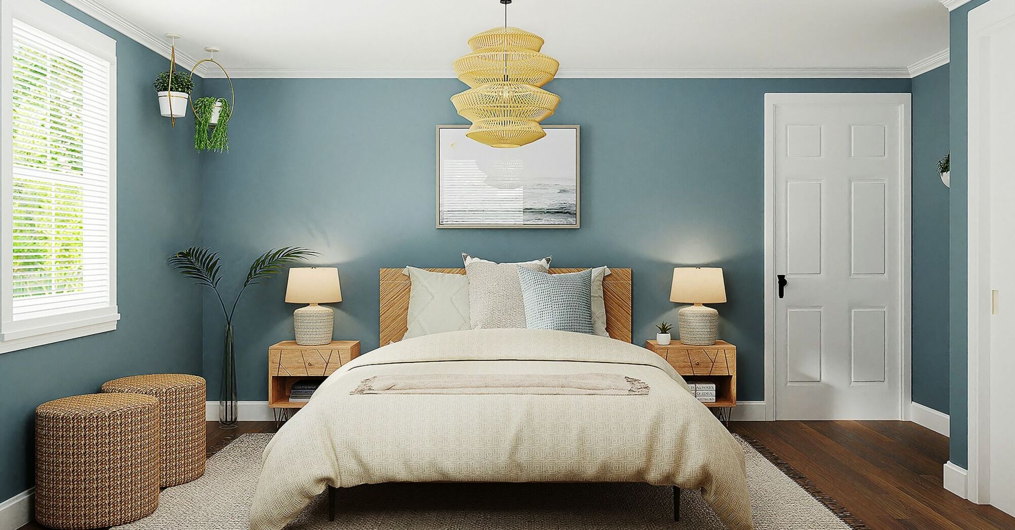 A cozy bedroom with a light beige bedspread, wooden furniture, blue walls, and natural lighting through a window