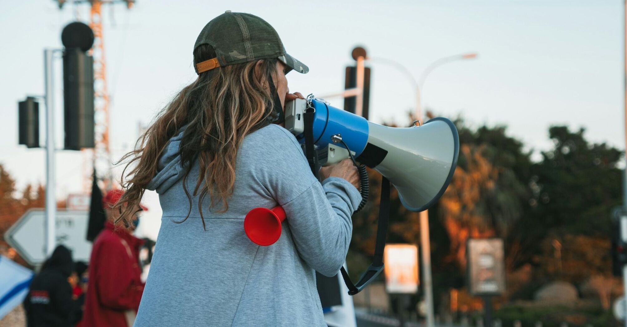 A protester using a megaphone during a demonstration