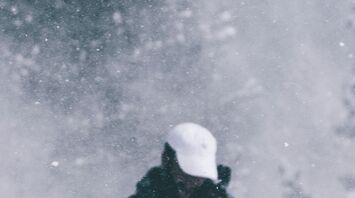 Dark storm clouds gathering in the sky, indicating severe weather conditions