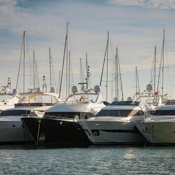 Luxury yachts docked in a marina