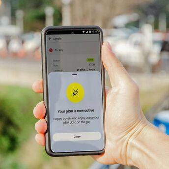 A smartphone screen showing an active eSIM data plan, highlighting internet connectivity for travelers