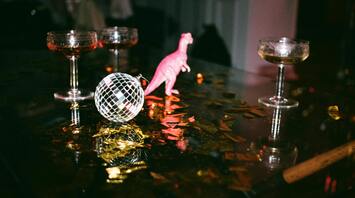 Glasses and party decorations on a table